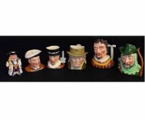 Collection of Sylvac character jugs including Robin Hood, Sheriff of Nottingham and a Beswick jug of