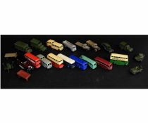 Two trays containing 22 assorted play worn Dinky Toys models to include buses, military vehicles etc