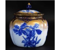 Doulton Burslem lidded biscuit barrel of lobed form with blue printed irises among a gilded and