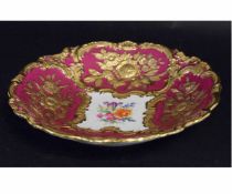 Modern Meissen bowl, the puce ground with overlaid gilt decoration, floral spray to the centre,