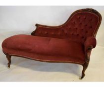 Victorian mahogany framed chaise longue with carved detail with red Dralon upholstered seat and