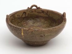Chinese marbled clay pottery bowl with green wash and glaze of Song style, applied loop handles to