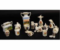 Collection of heraldic china by various factories including Shelley and Carlton china, largest being