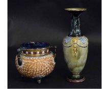 Doulton Lambeth cauldron vase fitted with three handles and pegged feet, with a gilded body and