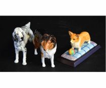 Collection of three Royal Doulton models of dogs, including a Collie, a Setter and a Corgi,