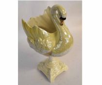 Victorian yellow lustre jardiniere modelled as a swan on a square formed stand, 50cms tall