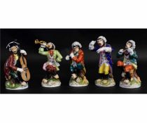 Group of Continental porcelain monkey band figures marked with Dresden mark, including violinist,