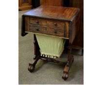 Regency mahogany drop leaf work table fitted with two drawers with plank supports and scrolling