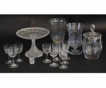 Cut glass tazza with a series of other small liqueur glasses and two glass goblets with engraved