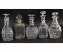 Group of five 19th century cut glass decanters, including two three-ring examples with hobnail cut