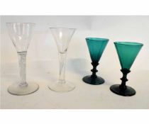 18th/19th century wine glass with air twist stem and a further tear drop example together with two