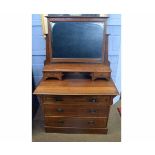 Arts & Crafts oak dressing chest with chequer banded inlay with mirrored back and open shelf, fitted