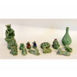 Group of small animals, dogs and ducks, and a vase and figure, all modelled in pottery with a