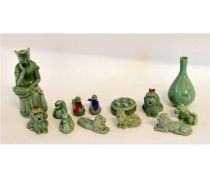 Group of small animals, dogs and ducks, and a vase and figure, all modelled in pottery with a