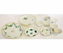 Group of Chelsea Derby and possibly Bristol wares all decorated in green enamel with a floral