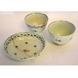 Lowestoft late 18th century tea bowl and saucer, with Derby style sprigs of flowers within a feather