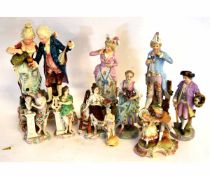 Group of nine assorted 19th/20th century Continental figures, tallest approx 22cms