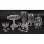 Cut glass tazza with a series of other small liqueur glasses and two glass goblets with engraved