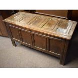 17th century oak six-plank coffer with four panelled front, 137cms wide x 54cms deep x 71cms high