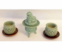 Oriental censer and cover with dragon finial, decorated with fish on a celadon ground, together with