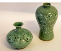 Two vases, one squat vase, and one of baluster shape, decorated with birds on a celadon ground,