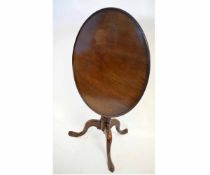 Early 19th century mahogany circular tilt top pedestal table with tripod base, 83cms diam