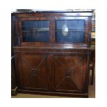 Rosewood side cabinet fitted throughout with beaded mounts, glazed top over two panelled doors