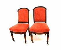 Set of six parcel ebonised dining chairs, hoop backs, upholstered in pink