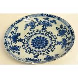 Large Chinese charger decorated in Kangxi fashion with an artensia leaf mark to the base, blue and