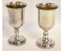 Pair of large silver plated goblets on circular bases with a knopped stem, 20cms tall