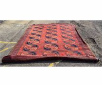 20th century rust ground Afghan type rug, 370 x 271cms