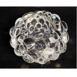 Squat formed clear glass candleholder of bubble design by Orrefors, 7cms tall