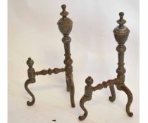 Pair of Georgian steel urn formed fire dogs on three scrolling legs with etched detail, 39cms tall