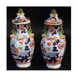 Pair of Mason's Ironstone vases decorated in rust, blue and green floral design in fence pattern,