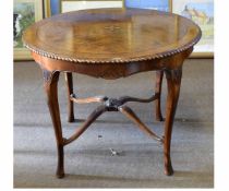Reproduction mahogany circular dining table with inlaid central panel, gadrooned edge and raised