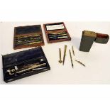 Two vintage teak cased sets of drawing instruments and a vintage green case containing mixed brass