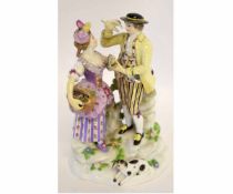19th century Meissen group, a gallant and lady, with a basket of flowers in her hand and the