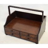 Mahogany shoe-shine box with handle over open shelf and four drawers below, 47cms wide