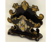 Good quality lacquered, painted and mother of pearl inlaid letter rack with scrolling detail, raised