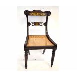 Regency mahogany dining chair with brass inlaid back and cane seat on reeded front legs