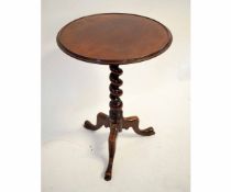 19th century mahogany wine table with a twisted column on a tripod base, 50cms diam x 67cms high