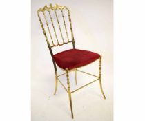 Good quality brass formed bedroom chair with spindle back and red Dralon upholstered seat on splayed