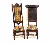 Two oak high backed hall chairs, one with cresting rail bearing date, each with upholstered seats