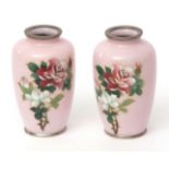 Pair of Japanese cloisonne vases with sprays of roses against a pink ground, plated mounts, probably