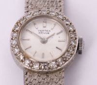 Third quarter of 20th century 9ct gold and diamond set ladies cocktail watch, Vertex "Revue", the