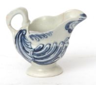 Liverpool (Reid or Chaffers) dolphin shaped creamer, circa 1770, the moulding highlighted in