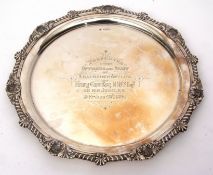 Victorian silver tray of circular form with cast and applied gadrooned shell and foliate border to a