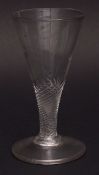 Late 19th century conical wine glass, wrythen stem and spreading circular foot, 14cms high