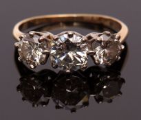 Precious metal diamond three-stone ring, having three graduated circular cut diamonds, total 1.