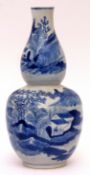 Chinese blue and white porcelain double gourd vase with mountainous village scenes, underglaze